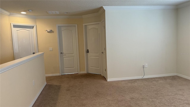 corridor with light colored carpet, a textured ceiling, and crown molding