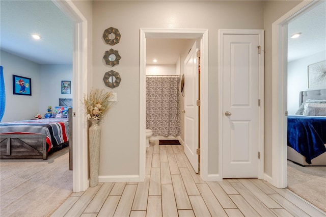 hallway featuring light wood-type flooring