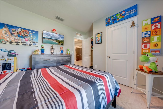 bedroom with light colored carpet