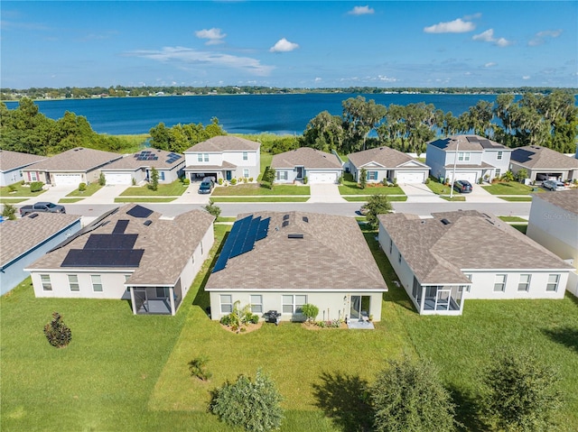 bird's eye view with a water view