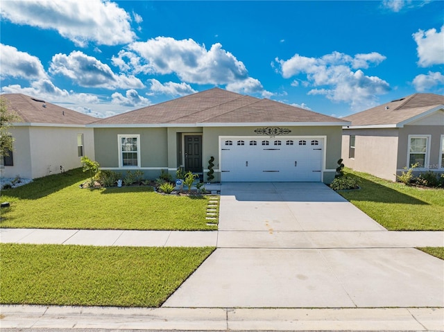 ranch-style home with a front yard and a garage