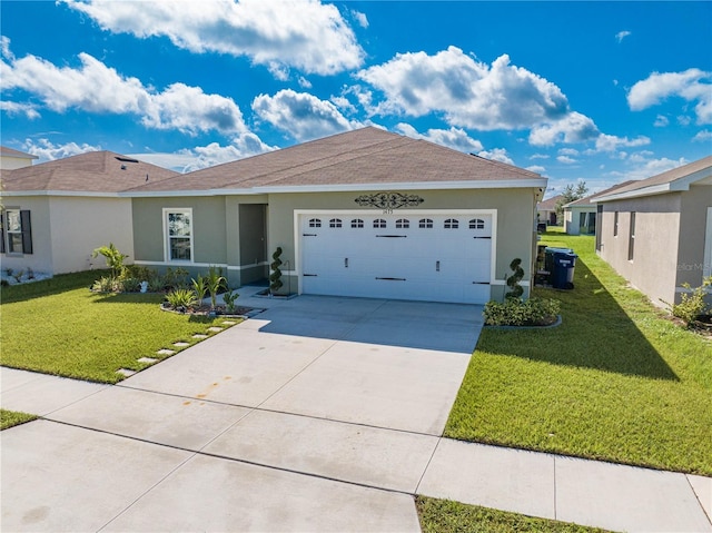 single story home featuring a garage and a front lawn