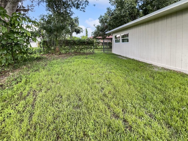 view of yard with fence