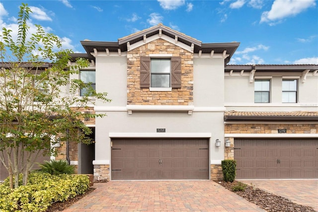 view of front of property featuring a garage