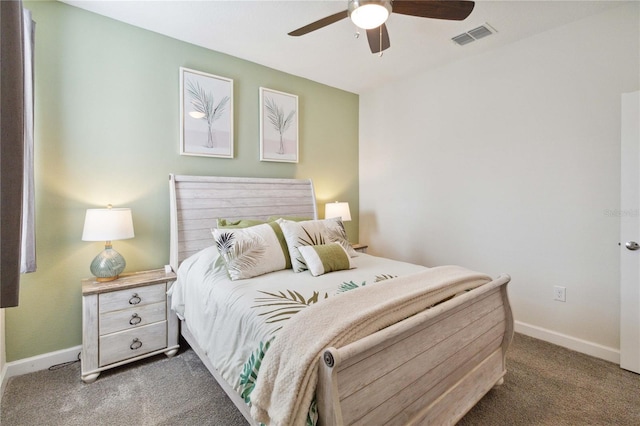 bedroom featuring dark colored carpet and ceiling fan