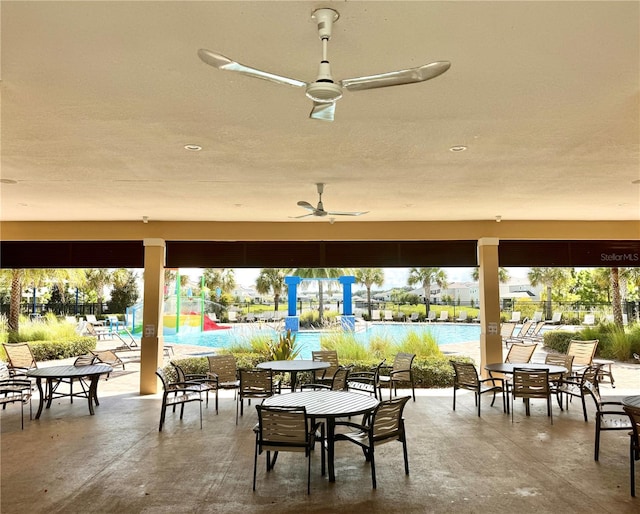 view of patio with a community pool