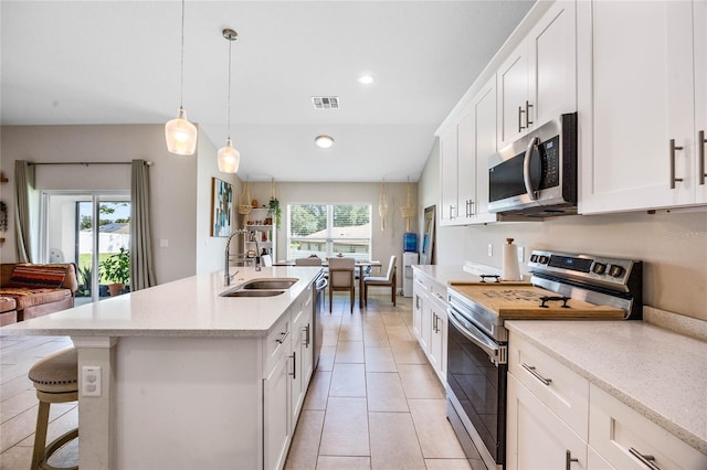 kitchen with white cabinetry, sink, and appliances with stainless steel finishes