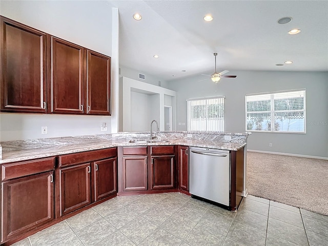 kitchen featuring dishwasher, light colored carpet, sink, lofted ceiling, and ceiling fan