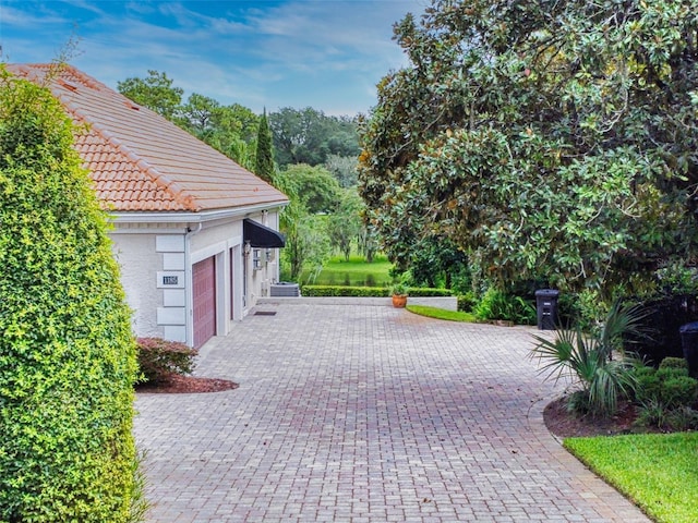 view of patio / terrace with a garage