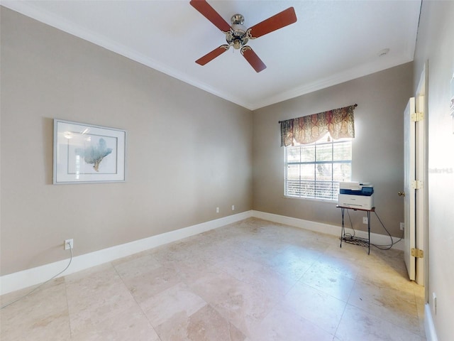 spare room with ornamental molding and ceiling fan