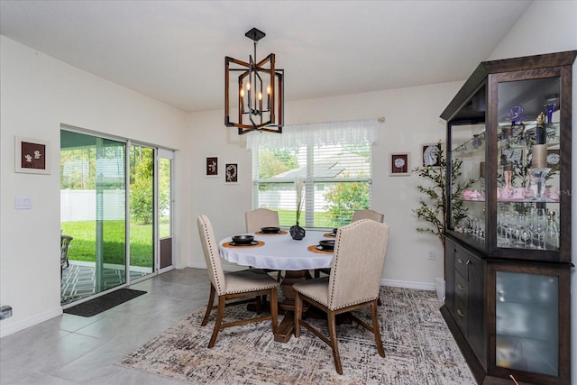 25 Bahia Crse, Ocala, FL 34472 - dining room with a chandelier, baseboards, and a wealth of natural light