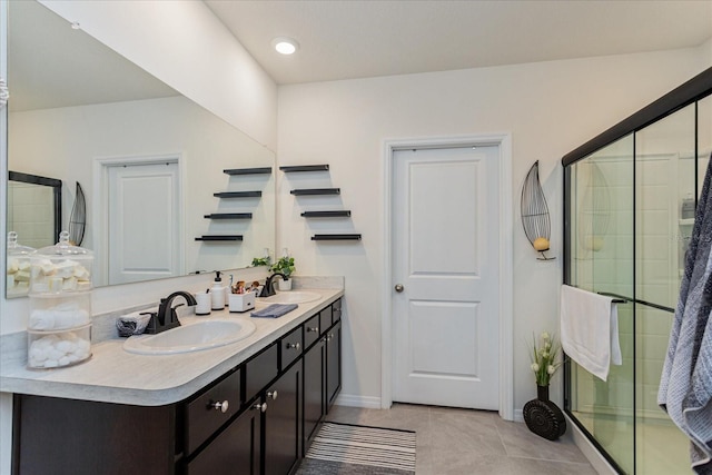 bathroom featuring vanity, walk in shower, and tile patterned floors