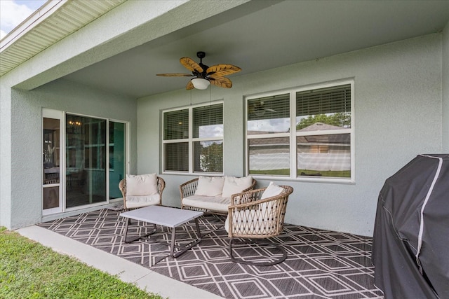 view of patio featuring ceiling fan