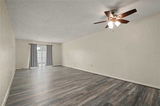 spare room featuring a textured ceiling, ceiling fan, and dark hardwood / wood-style floors