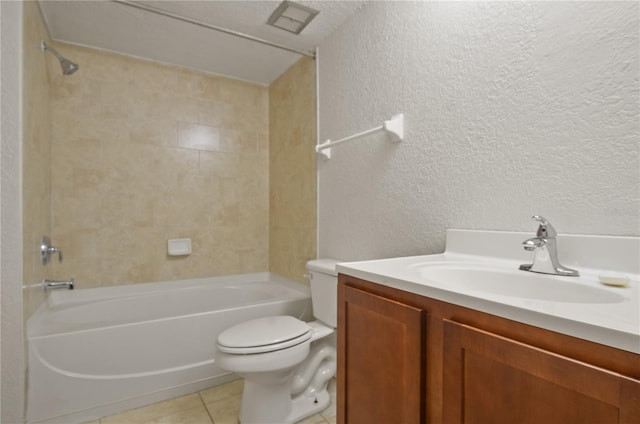 full bathroom with tile patterned flooring, vanity, toilet, and tiled shower / bath combo