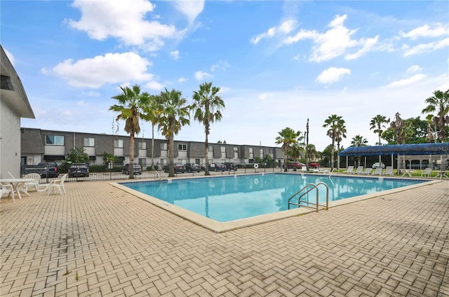 view of pool featuring a patio