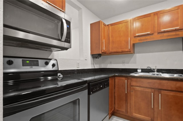 kitchen with appliances with stainless steel finishes and sink