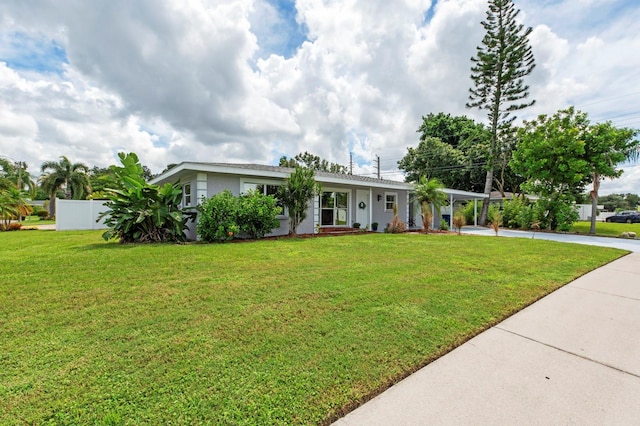 ranch-style house with a front yard