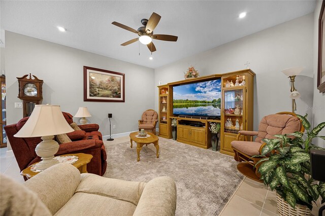 tiled living room featuring ceiling fan