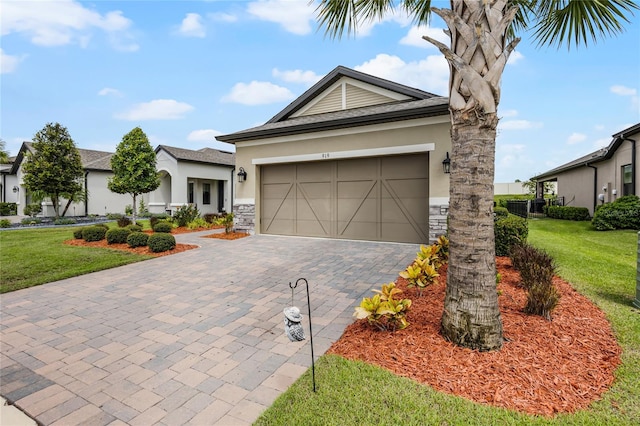 single story home with a garage and a front yard