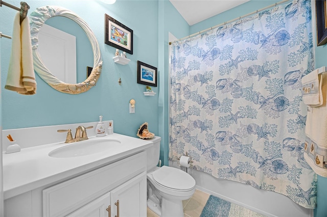 full bathroom with tile patterned floors, toilet, shower / tub combo with curtain, and vanity