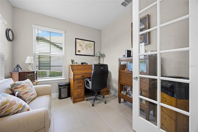 tiled office space with a wealth of natural light