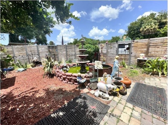 view of yard with a patio area