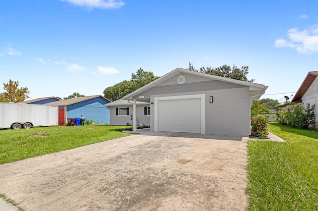 single story home featuring a garage and a front yard