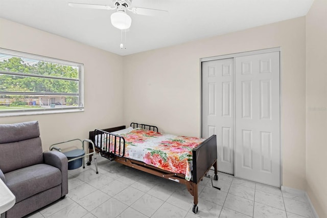 bedroom featuring a closet and ceiling fan