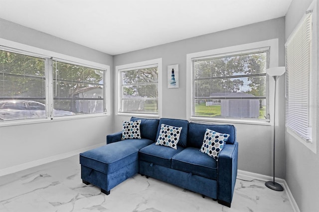 sunroom featuring a wealth of natural light