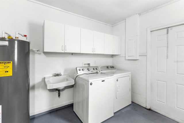 washroom featuring gas water heater, separate washer and dryer, cabinets, and sink