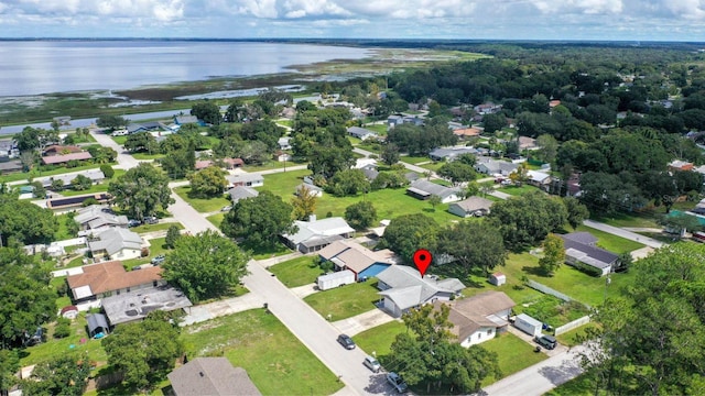 drone / aerial view featuring a water view