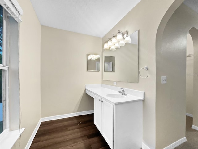 bathroom with wood-type flooring and vanity