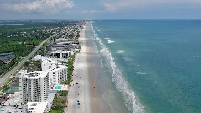 bird's eye view featuring a beach view and a water view