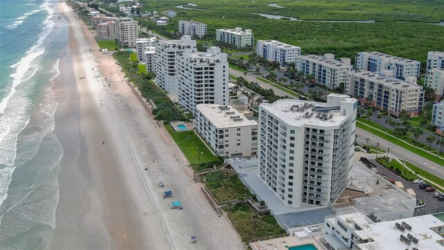 drone / aerial view with a view of the beach and a water view