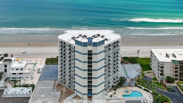 drone / aerial view with a view of the beach and a water view