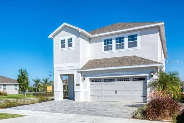 view of front of house with a garage