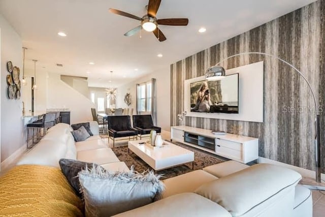 living room featuring ceiling fan