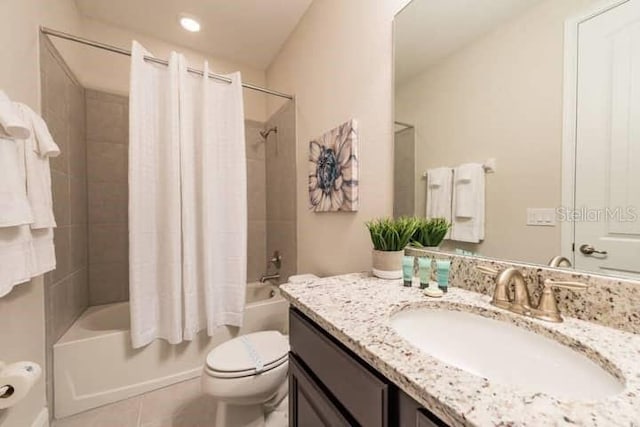 full bathroom with vanity, toilet, tile patterned flooring, and shower / bathtub combination with curtain