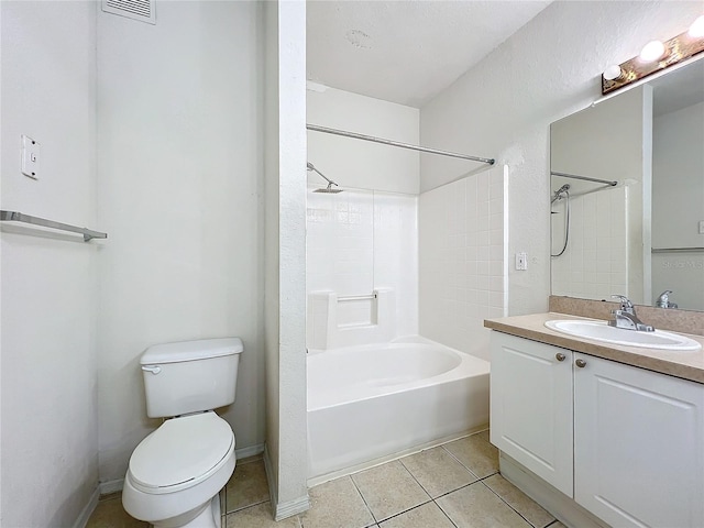 full bathroom with tile patterned flooring, vanity, toilet, and tiled shower / bath combo