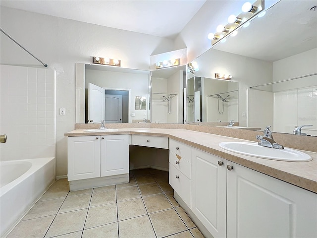 bathroom with bathtub / shower combination, tile patterned flooring, vaulted ceiling, and vanity