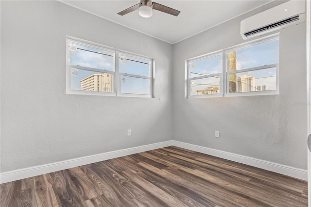 701 N Grandview Ave, Daytona Beach, FL 32118 - empty room featuring a wall unit AC, baseboards, dark wood-type flooring, a ceiling fan, and ornamental molding