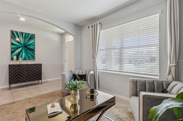 living room with light tile patterned floors