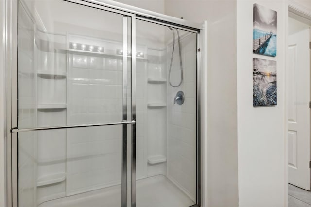 bathroom featuring an enclosed shower