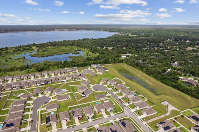 birds eye view of property featuring a water view