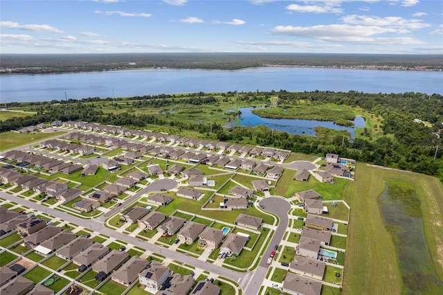 drone / aerial view with a water view