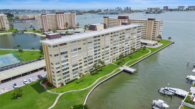 birds eye view of property with a water view