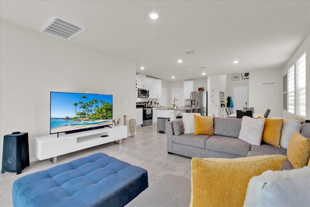 living room featuring light tile patterned floors