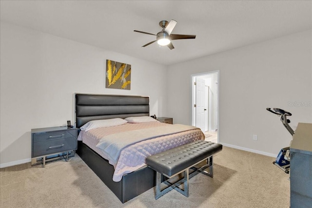 bedroom featuring ceiling fan and light carpet