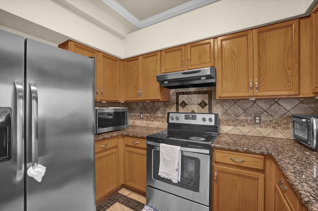 kitchen with crown molding, appliances with stainless steel finishes, backsplash, and light tile patterned floors